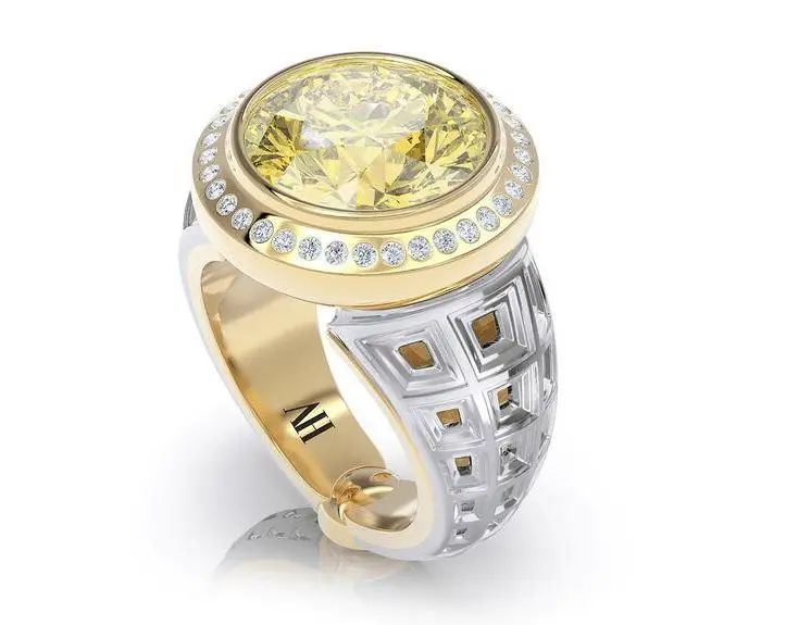 Alice Herald's "Dreamer" ring beautifully combines white gold, yellow gold, sapphires, and diamonds