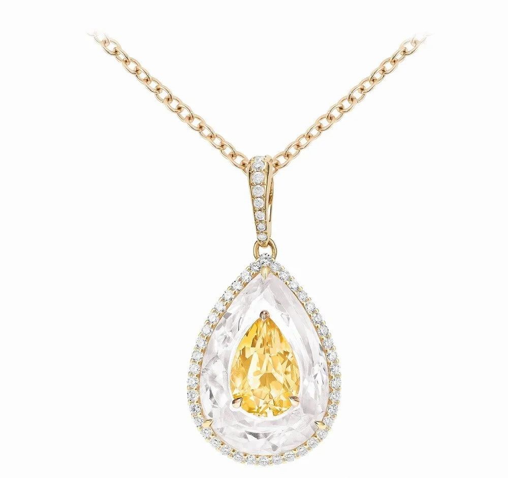 Inlay Shine Gold Pendant, by Boghossian.
Set with one 1.6ct pear-cut citrine, one 6.45ct pear-cut crystal, and round brilliant-cut diamonds.