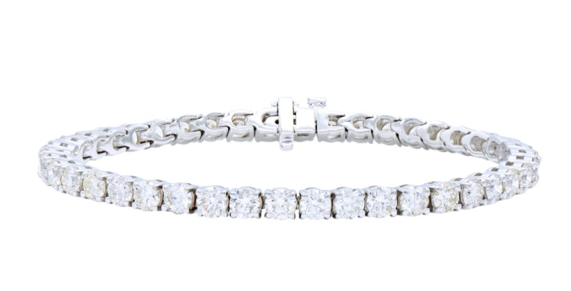 Platinum and 10.20-carat diamond tennis bracelet, $16,000.