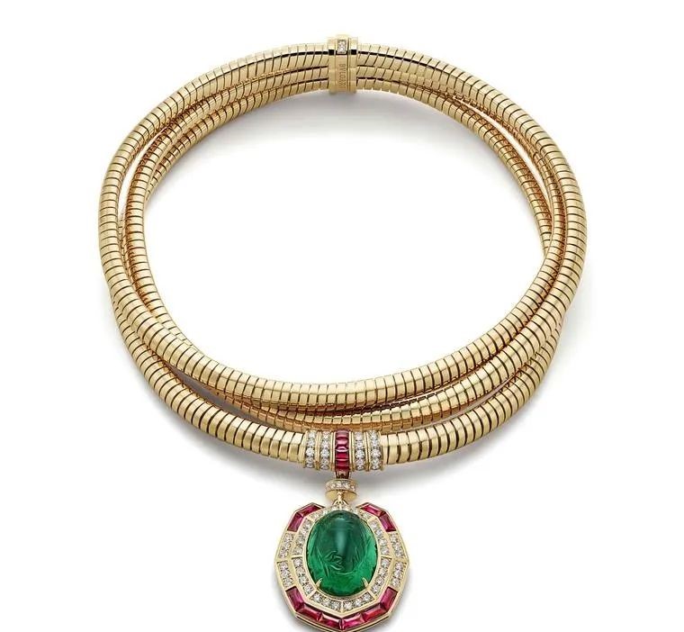 Bvlgari's iconic Tubogas design is set with a carved 31.07-carat oval Zambian emerald.