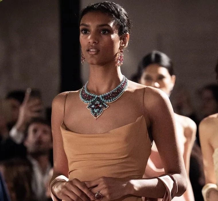 A model wears Bvlgari's Lotus Cabochon necklace, part of the Aeterna collection exhibited by Bvlgari at the ancient Roman baths, released to commemorate Bvlgari's 140th anniversary and pay tribute to its Roman origins.