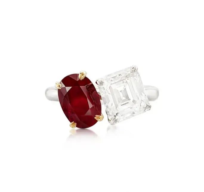 This is a 3.03-carat oval ruby and a 3.01-carat emerald-cut diamond.