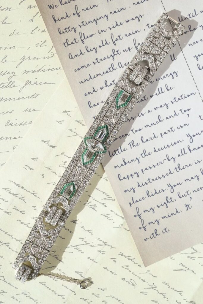 Lueur antique jewelry
Art Deco platinum diamond emerald bracelet