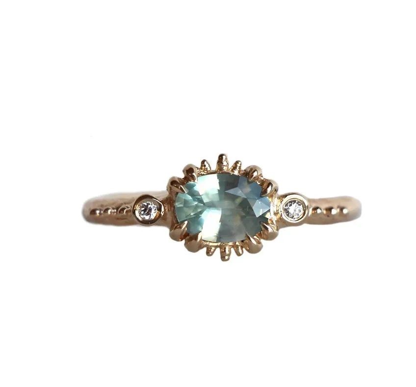 Gypsy Cove gold ring, by Alice Clarke.
Set with Montana Sapphires and diamonds.